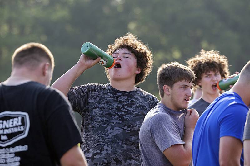 The Morrison football team goes through workouts during a camp Tuesday, July 25, 2023. The Mustangs will open their season against Mendota at the end of August.