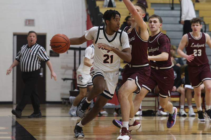 Lincoln-Way Central’s Korey Cagnolatti looks to pass against Lockport on Tuesday, Jan. 23rd, 2024 in New Lenox.