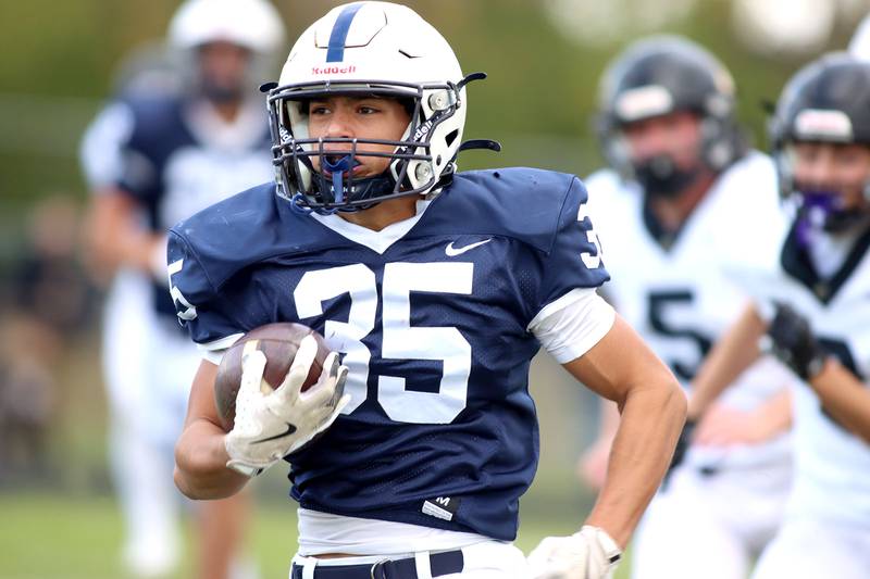 Cary-Grove’s Leo Zavala runs the ball against Sycamore in IHSA football Class 5A first-round playoff action at Al Bohrer Field on the campus of Cary-Grove High School in Cary on Saturday, November 1, 2025.