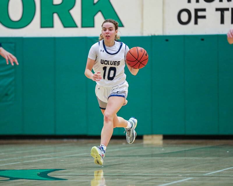 Oswego East's Myella Dart (10) races down the court at the York Thanksgiving Tournament. Nov 13, 2023.