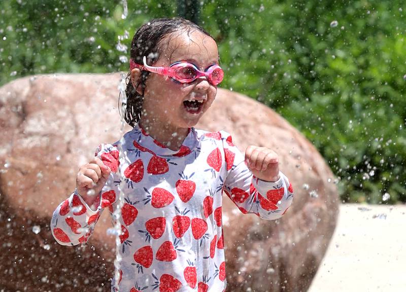Lillian Welch, 4, from Davis Junction, has some fun in the water Tuesday, June 24, 2025, on the splash pad at Welsh Park in DeKalb.