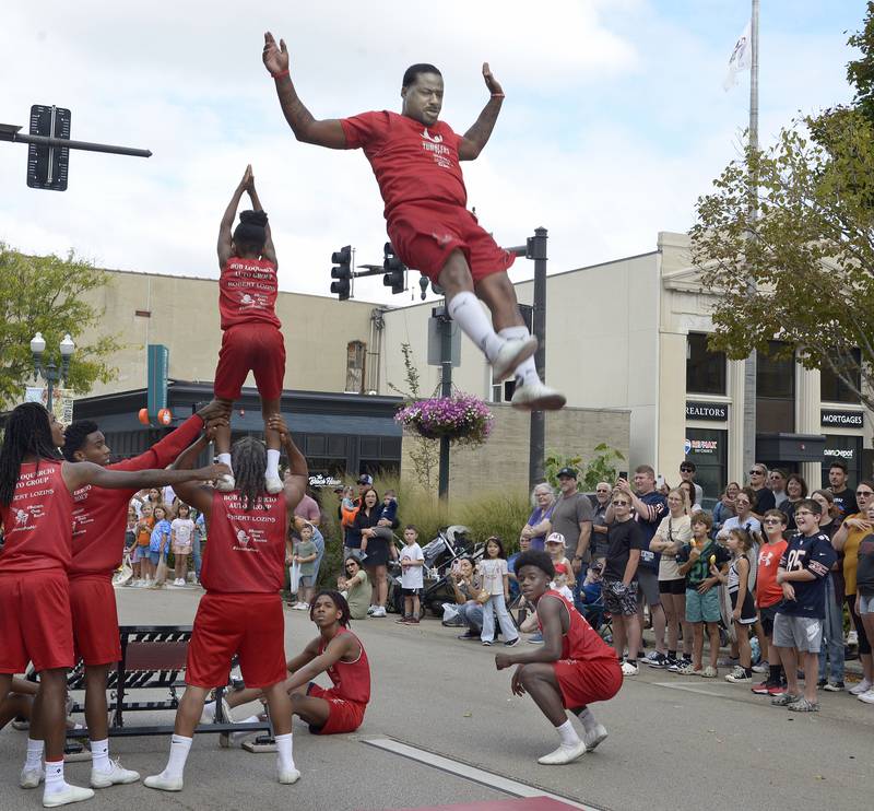 The Jesse White Tumblers entertained the crowd along the parade route with their acrobatic skills Sunday, Sept. 29, 2024, during Ottawa’s Fall Fest Parade.
