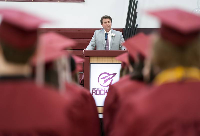 Richmond-Burton Community High School Principal Mike Baird delivers remarks during the graduation ceremony for the class of 2022 on Sunday, May 22, 2022, in Richmond.