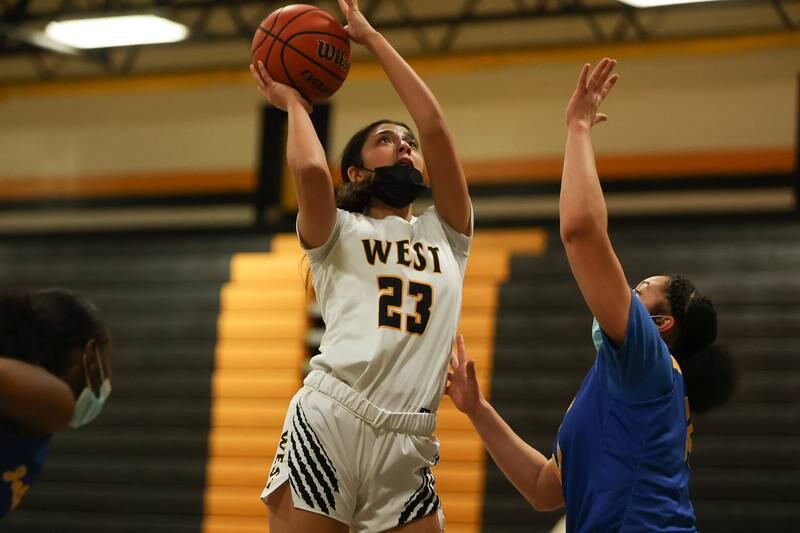 Joliet West’s Miranda Rosales puts up a shot against Joliet Central. Tuesday, Feb. 8, 2022, in Joliet.