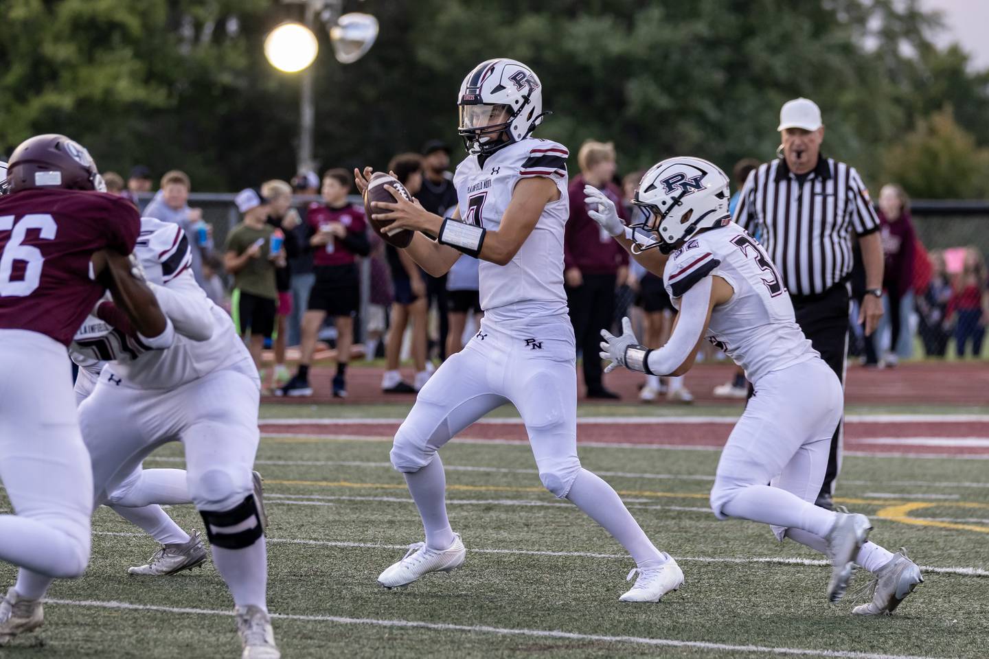 Plainfield North's Easton Isaacson scans the field during a varsity football game against Lockport on Aug. 29, 2025.