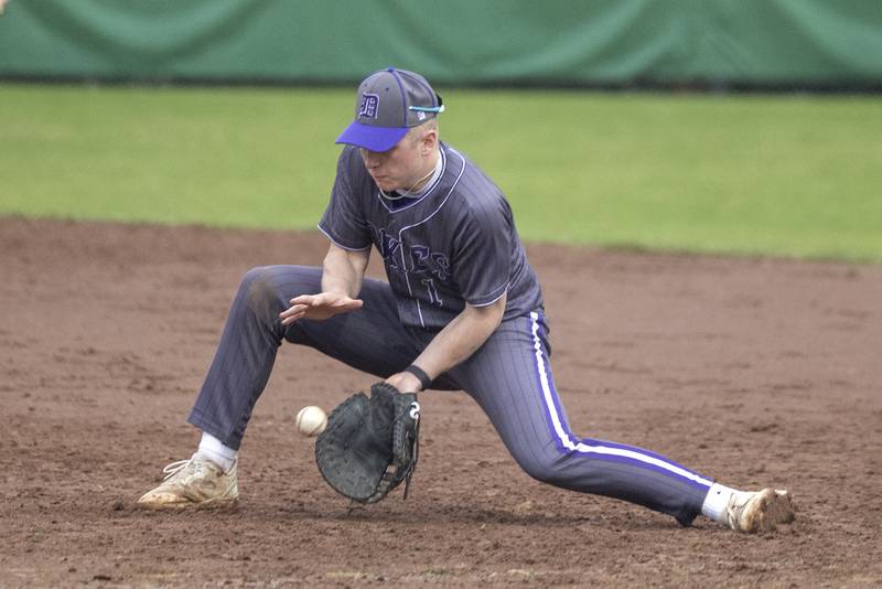 Dixon’s Jake Whelan fields a ball at first base against Rock Falls Thursday, April 9, 2026.