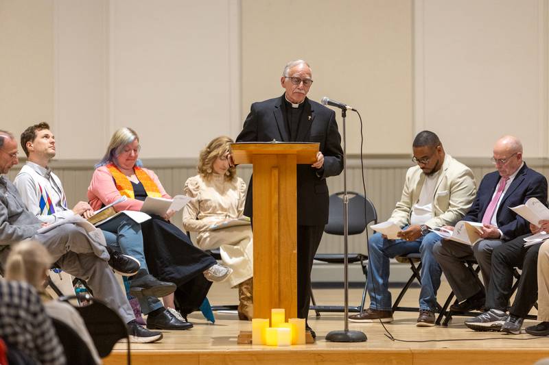 The Rev. Michael Rasicci speaks at the International Peace Vigil on Sunday, Nov.23, 2025, at Shannon Hall in Batavia.