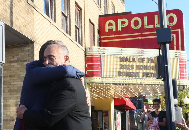 Dan Martinkus, retired drama instructor at Princeton High School, hugs actorRobert Petkoff  during the "Walk of Fame" dedication on Thursday, Sept. 4, 2025 at the Apollo Theater in Princeton. Petkoff was born in Sacremento Calf., and moved to Princeton where he was involved in Princeton High School theater.
