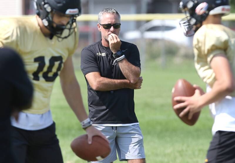 Sycamore football head coach Joe Ryan watches his quarterbacks during practice Monday, July 17, 2023 at the school.