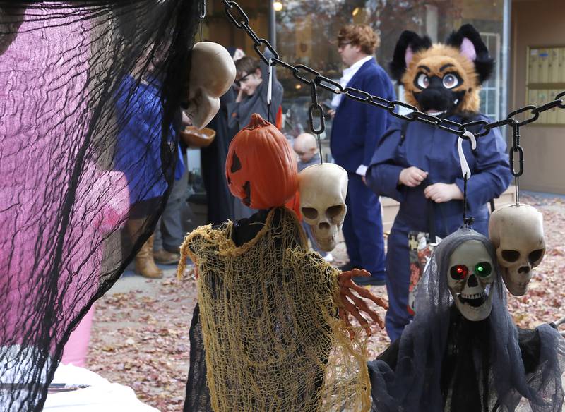 Trick or treaters make their way around the Woodstock Square during Halloween on the Square on Thursday, Oct. 31, 2024, in Woodstock.