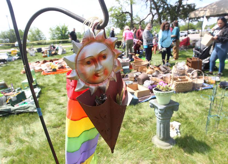 A metal sun plant holder was featured in the "Garden Treasures" area Saturday, May 20, 2023, during the Lake County Extension Master Gardener Spring Plant Sale at the University of Illinois Extension in Grayslake.