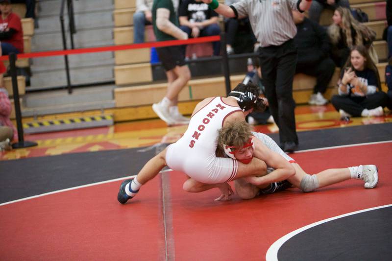 Yorkville's Nathan Craft competes with Moline's Dominick Diaz in the 126 lb. class Final at the Class 3A Regional on Saturday, Feb.3,2024 in Yorkville.