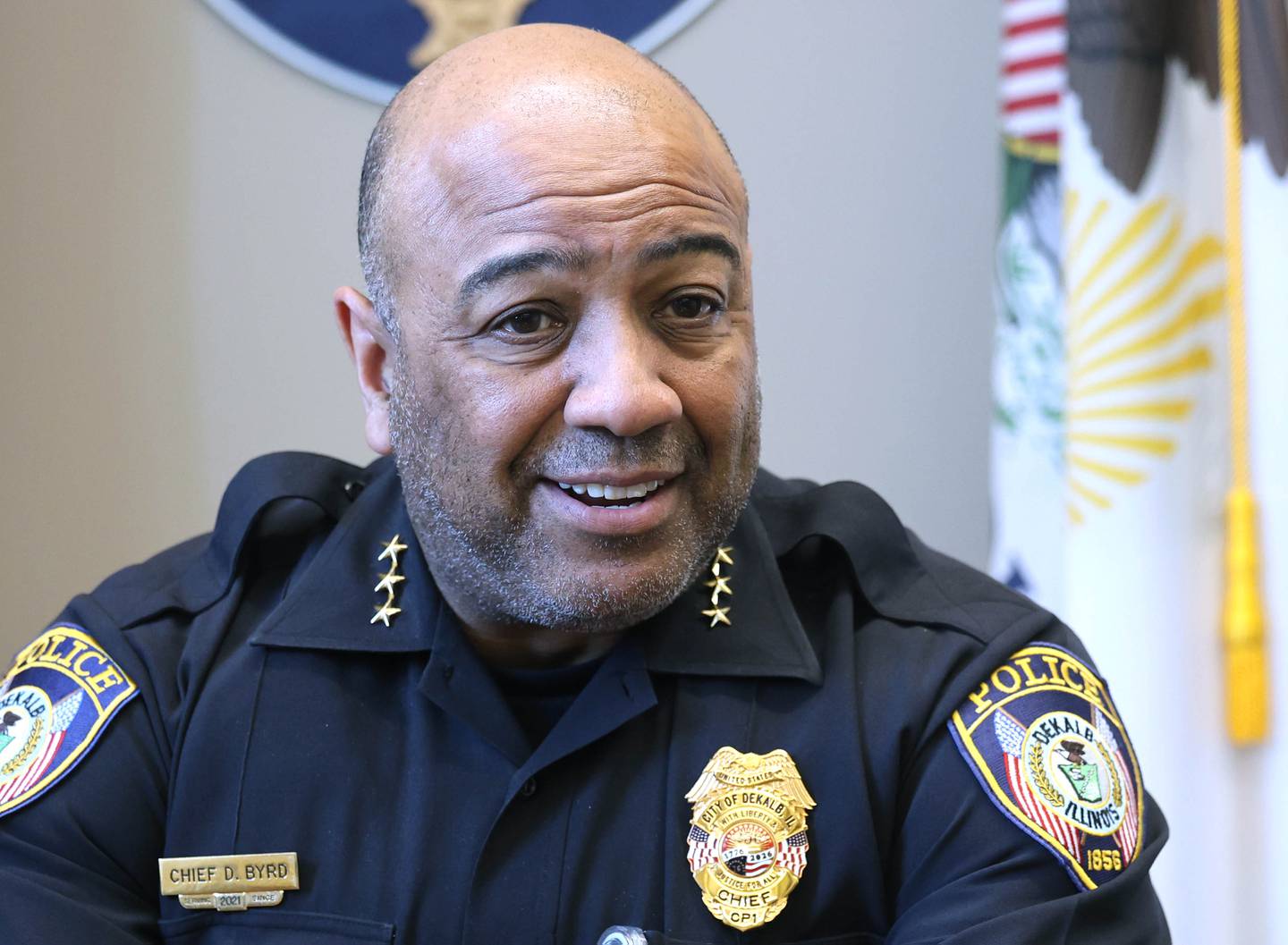 DeKalb Police Chief David Byrd smiles Thursday, April 16, 2026, at the police department, as he reflects on his first five year’s on the job in DeKalb.