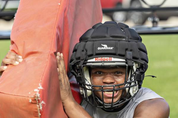 Photos: Dixon football takes the field
