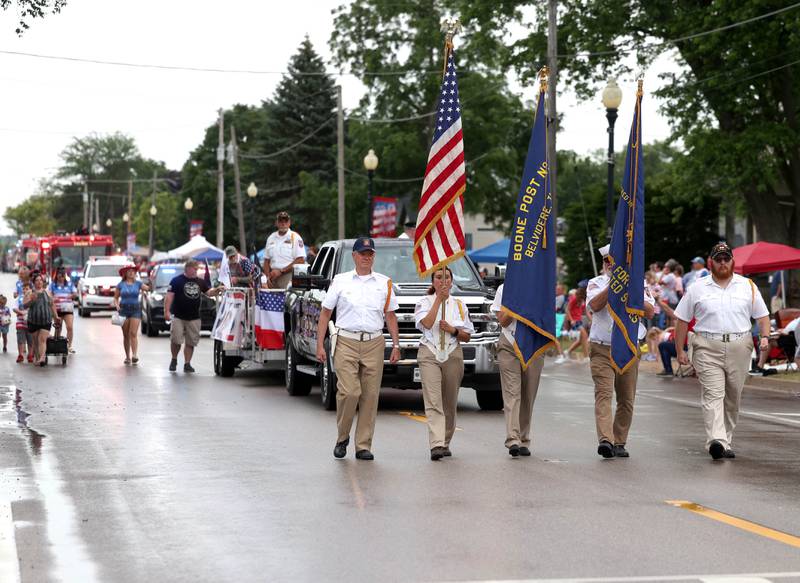 A color guard marches down Main Street at the head of the parade Friday, July 4, 2025, during the Fourth of July parade in downtown Kirkland.