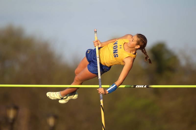 Lyons Township’s Leigh Ferrell competes in the pole vault during the Ritter Invite girls track and field meet at Downers Grove North on Friday, April 14, 2023.