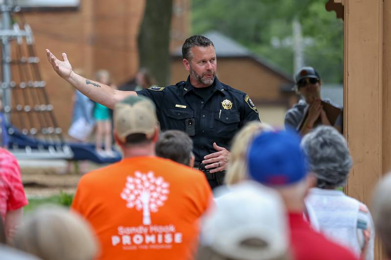 Sheriff Ron Hain speaks to the crowd during the March for Lives rally and march. June 11, 2022