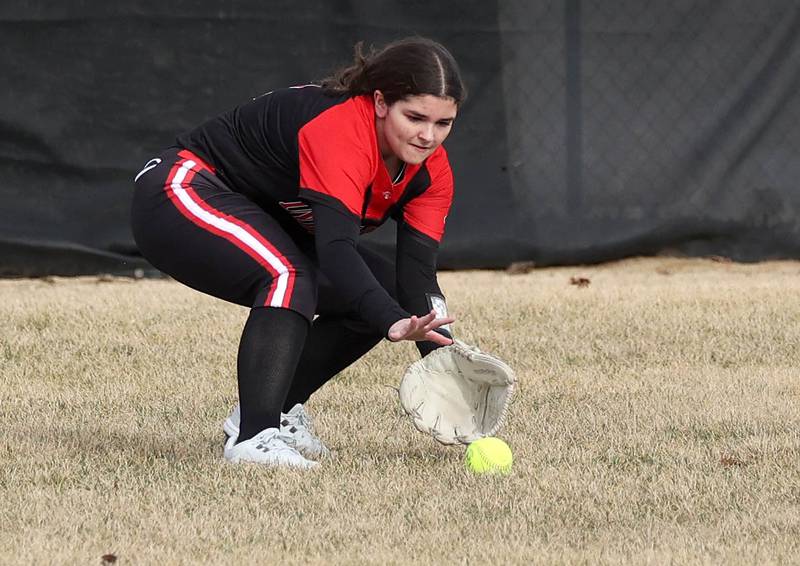 Indian Creek’s Ava Frances fields a ball in the outfield during their game against Genoa-Kingston Tuesday, March 18, 2025, at Indian Creek High School in Shabbona.