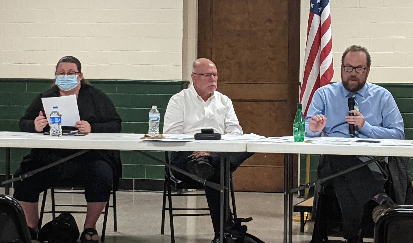 Dixon Library Director Antony Deter, right, speaks about possible policy changes during the Library Board meeting Monday, Aug. 8, 2022.