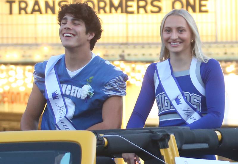 Princeton High School senior court attendants Ace Christiansen and Ashiynn Weber ride during the Homecoming parade on Thursday, Oct. 3, 2024 downtown Princeton.