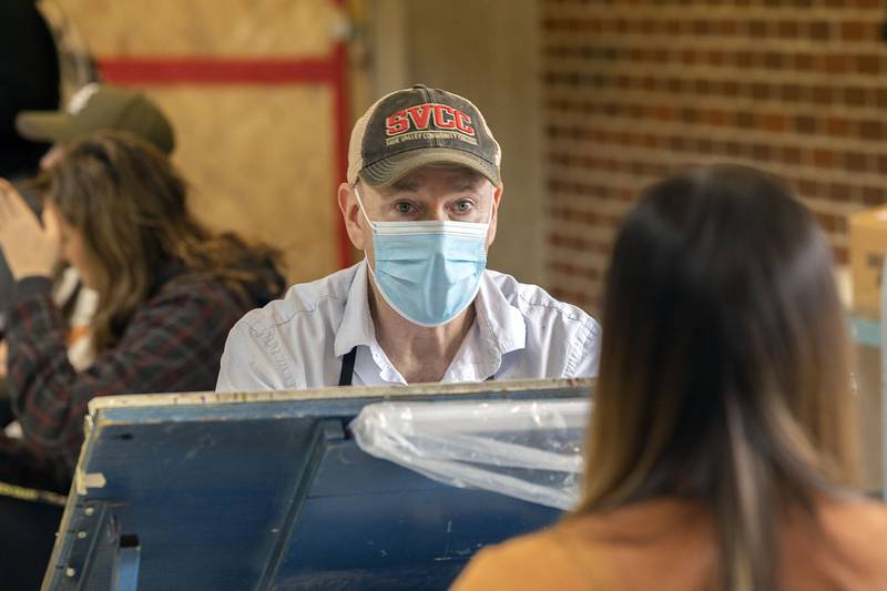 Kevin Berg focuses on his subject during at event at Sauk Valley Community College. The caricature artist was brought in to offer free sketches to students and staff as a welcome back to the school semester.