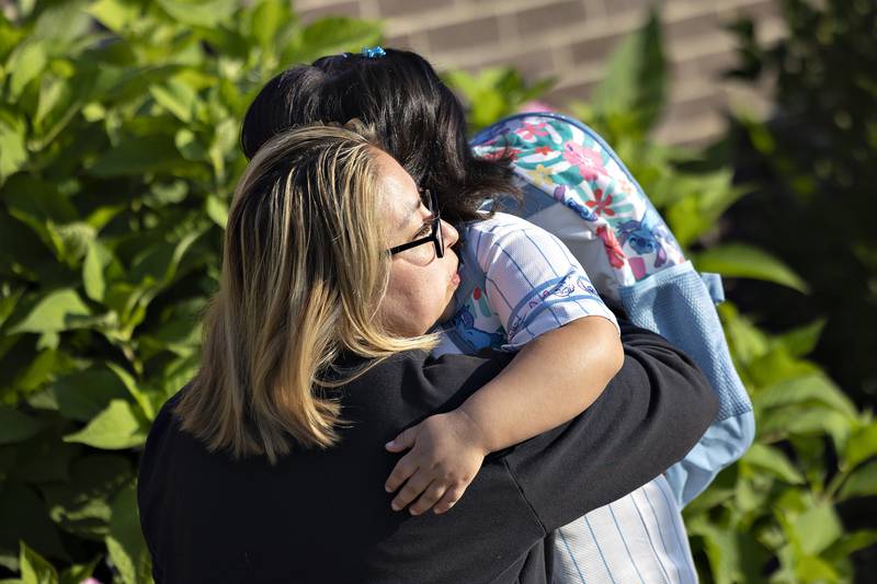 Gloria Vega hugs daughter Olivia, 5, as the young lady heads into kindergarten Thursday, August 14, 2025, at Jefferson School.