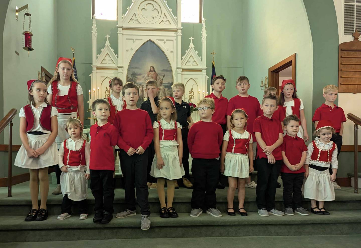 The Sunday school children at Stavanger Lutheran in Seneca sing traditional Norwegian songs during the Norwegian heritage service on Sunday, Oct. 5.