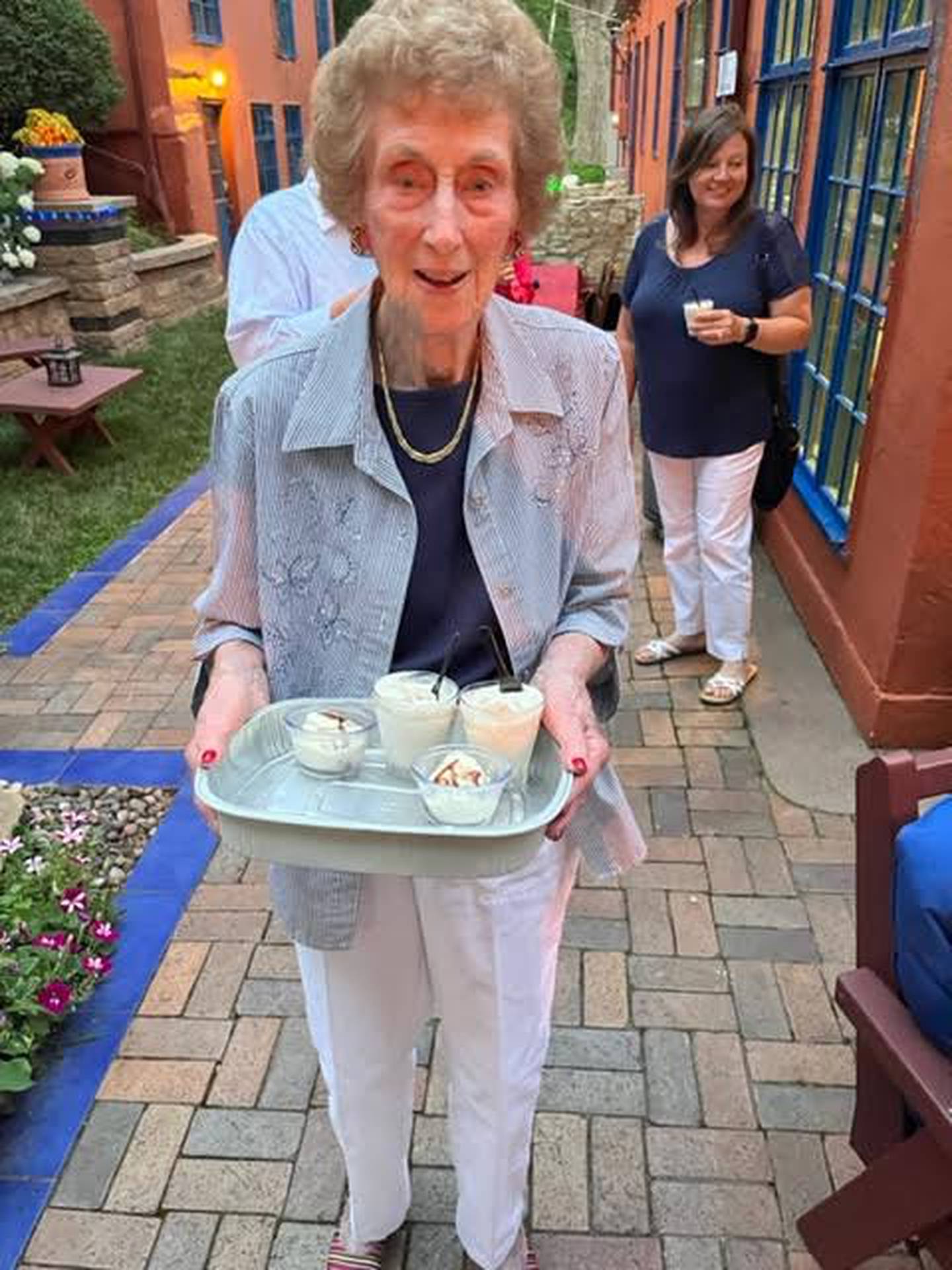 Doris Sobinsky serving her famous Brandy Alexanders.