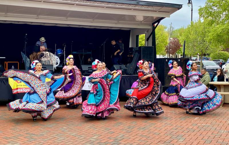 Dancers with Northern Illinois University's Ballet Folklórico Aztlán perform for the crowd on Sunday, May 4, 2025, in the Frank Van Buer Plaza in downtown DeKalb for the city's annual Cinco de Mayo Celebration.