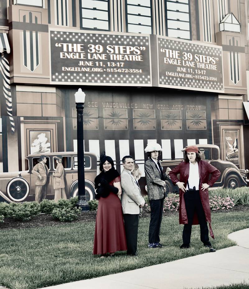 The cast of "The 39 Steps" (left to right) Marlee Reel, Dan McKenzie, Dalton Dean and Isaac Alvarado pose for a promotional photo at the Heritage Park mural, which just happens to reference the Alfred Hitchcock film in the marquee of the painting.