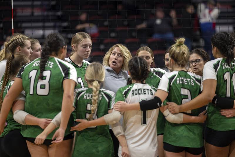 Coach Sheila Pillars speaks to her team following the Rocket’s two set loss against Breese Mater Dei in the 2A state semifinal Friday, Nov. 10, 2023 at CEFCU Arena in Normal.
