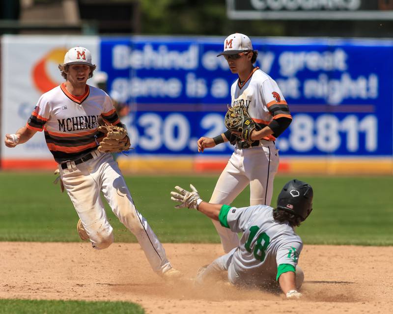 York's Alex Greene (8) slides into second base during the Class 4A Supersectional game between York at McHenry.  June 7, 2022.