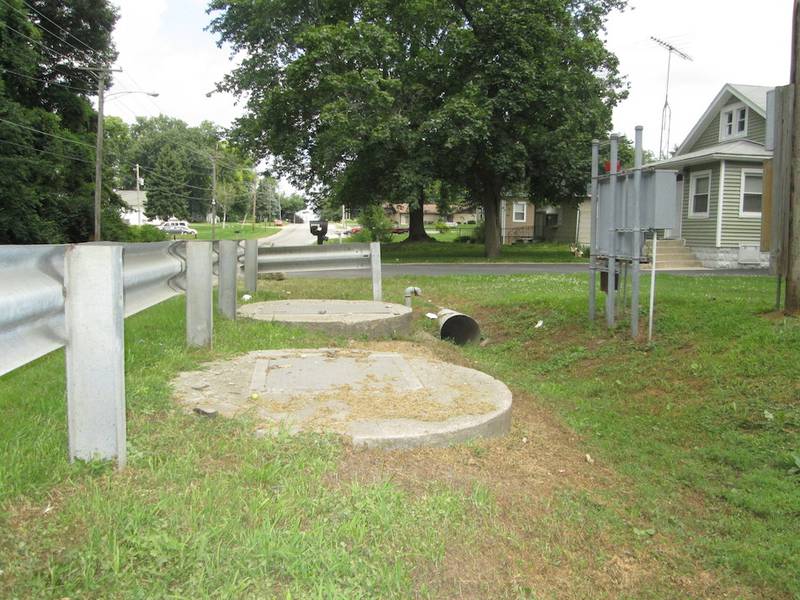 Joliet checks the meter at this Greenfield Sanitary District lift station located on Rowell Avenue.