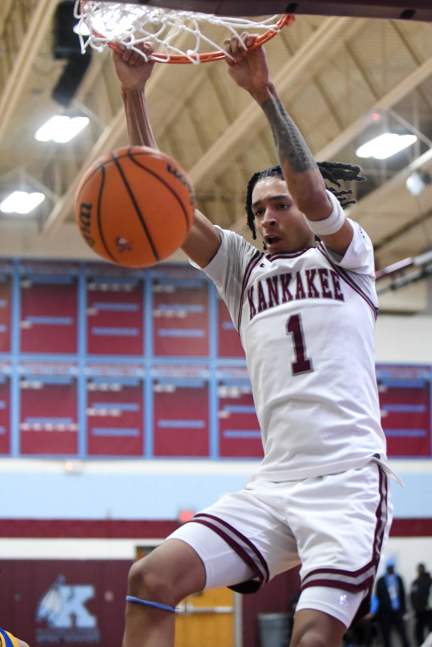 Kankakee's Lincoln Williams finishes a two-handed slam during a home boys basketball game against Crete Monee Tuesday, Feb. 4, 2025.