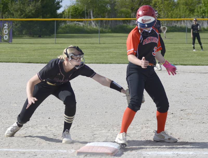 Gardner-South Wilmington’s Ella Mack gets back into first safely as Serena’s Cassie Walsh applies the tag Friday at Serena.