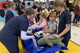 GAVC students run checkups on stuffed animals for Nettle Creek Elementary students