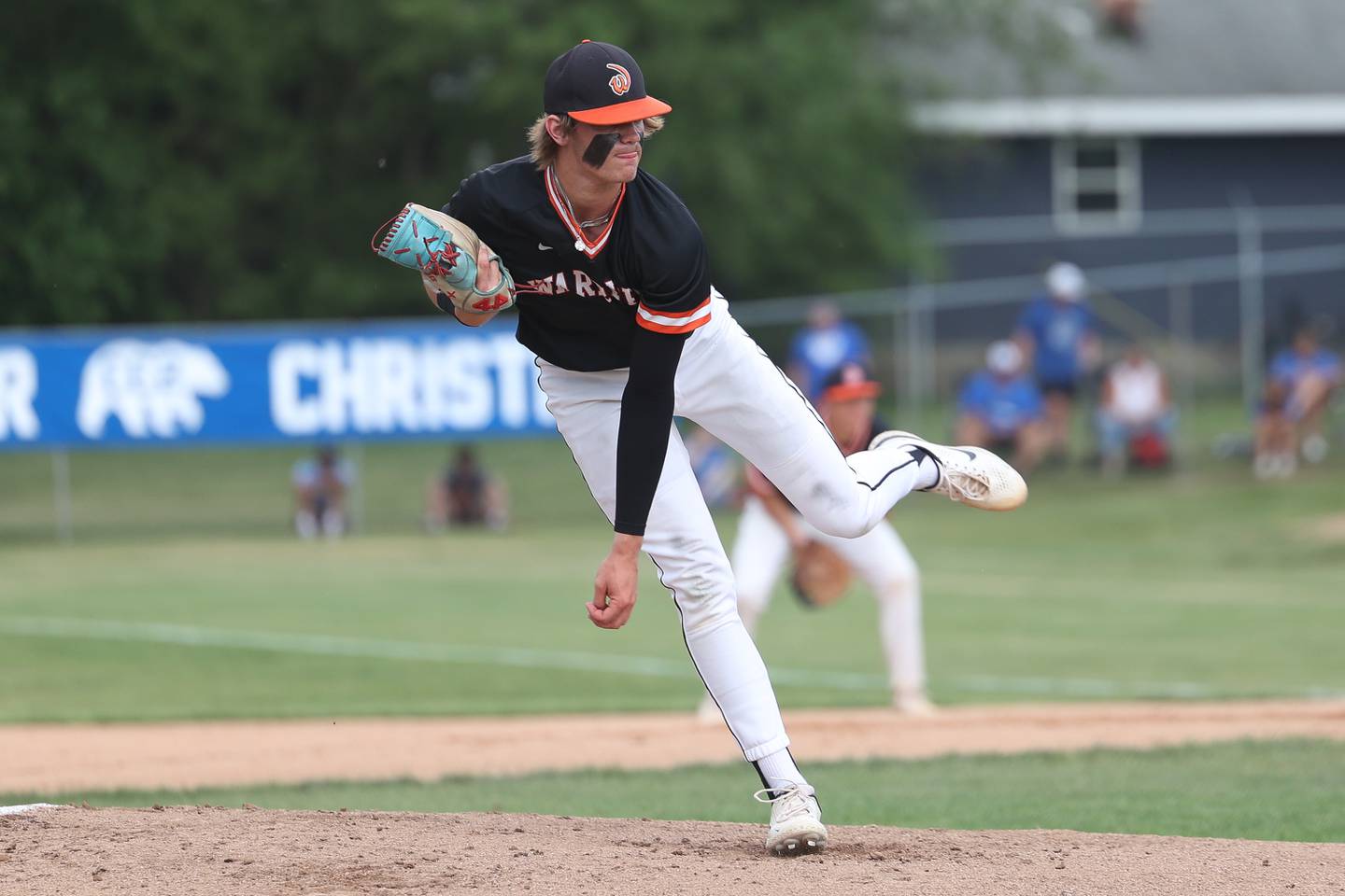 Lincoln-Way West’s Conor Essenburg follows through on a pitch against Lincoln-Way East in the Class 4A Lockport Sectional semifinal on Thursday, June 1, 2023 in Lockport.
