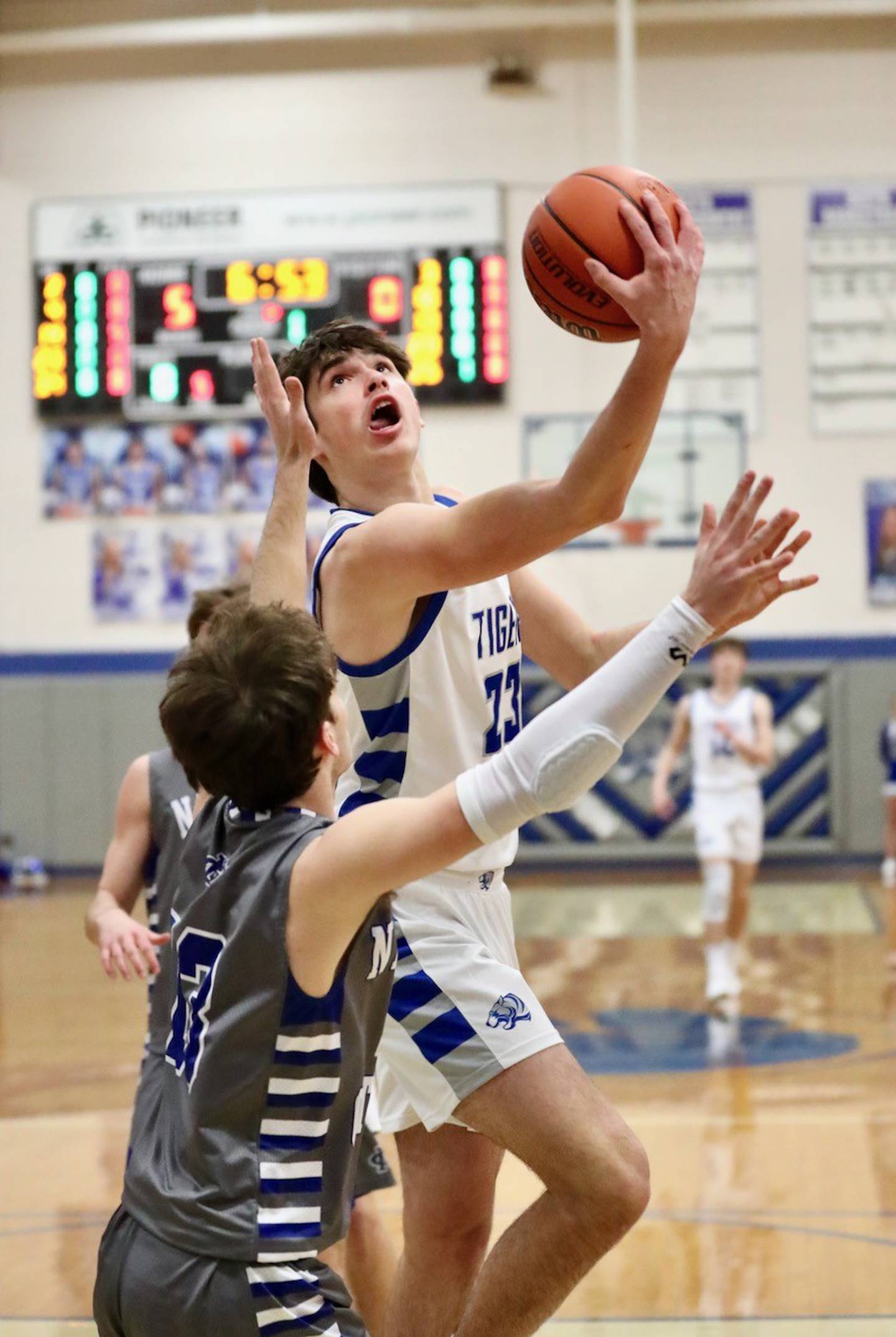 Princeton's Noah LaPorte shoots against Newman Friday night at Prouty Gym. The Tigers won 80-32.