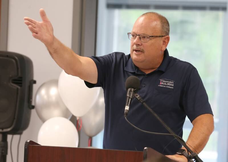 Dean Tieman president of Tieman Builders speaks during the ribbon cutting and dedication on Saturday, Aug. 5, 2023 in La Salle.