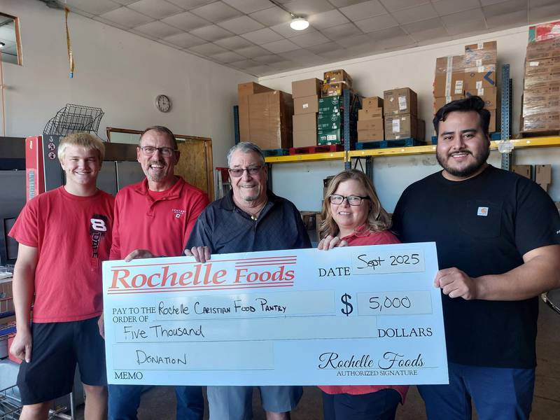 Rochelle Foods recently presented a $5,000 donation to the Rochelle Christian Food Pantry. RCFP thanked Hormel, Rochelle Foods’ owner, and its local employees. Pictured are RCFP volunteer Gavin, Rochelle Foods Plant Manager Tracy Brown, RCFP Board President Cal Jacobs, Jennifer Dewey (Rochelle Foods) and Angel Sanchez (Rochelle Foods).
