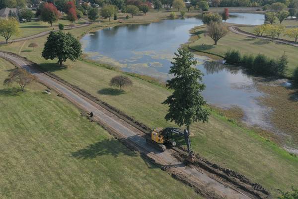 Photos: New 10-foot path replaces old walkway around Baker Lake in Peru