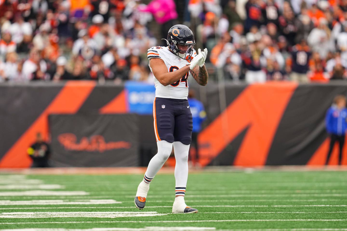 Chicago Bears defensive end Austin Booker (94) reacts during an NFL football game against the Cincinnati Bengals Sunday, Nov. 3, 2025, in Cincinnati. (AP Photo/Jeff Dean)