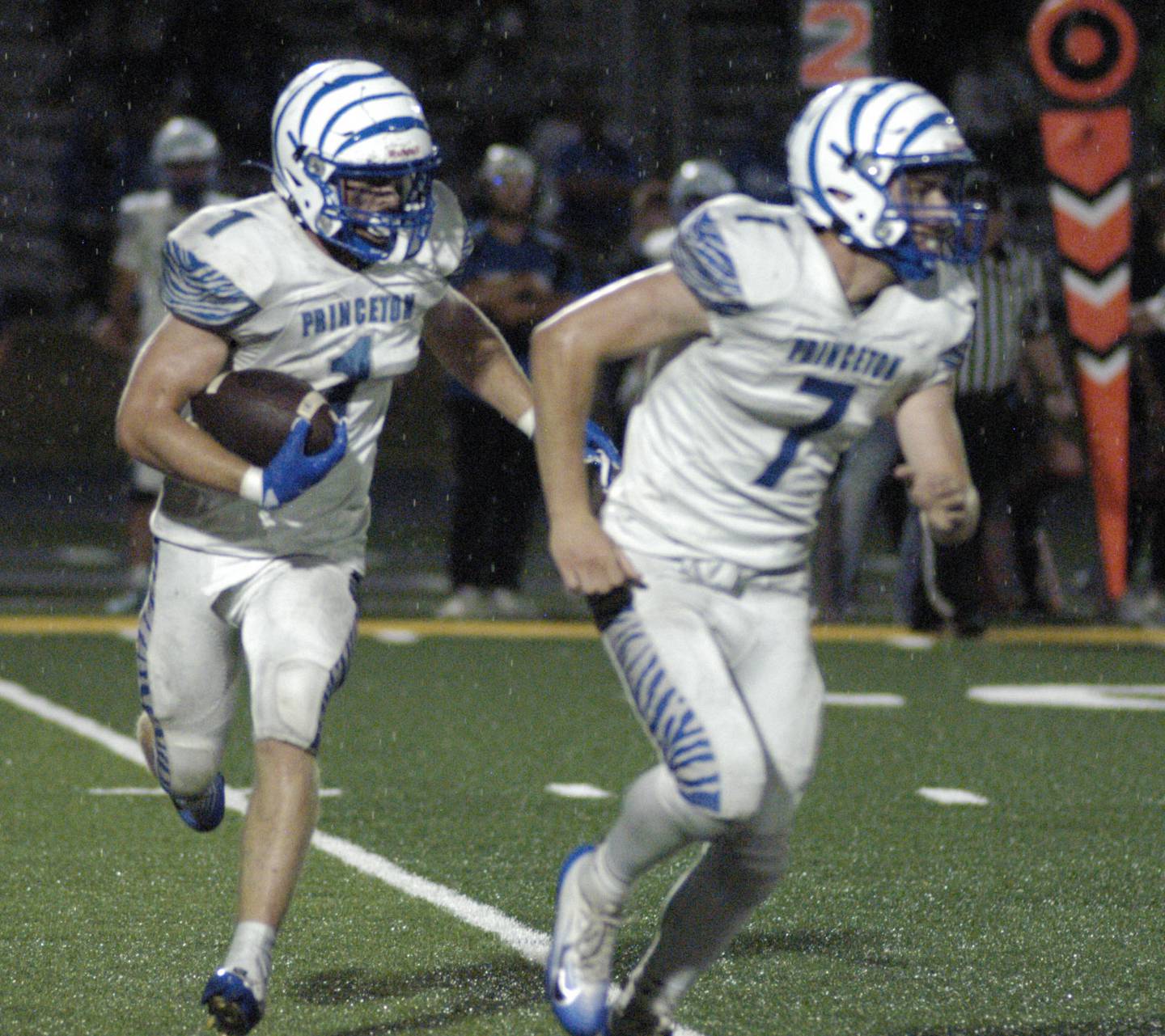 Princeton's  Casey Etheridge follow a block by Gavin Lanham. Newman Central Catholic H.S hosted Princeton H.S. in a non-conference football game at Sterling H.S, on Friday, August 29, 2025.