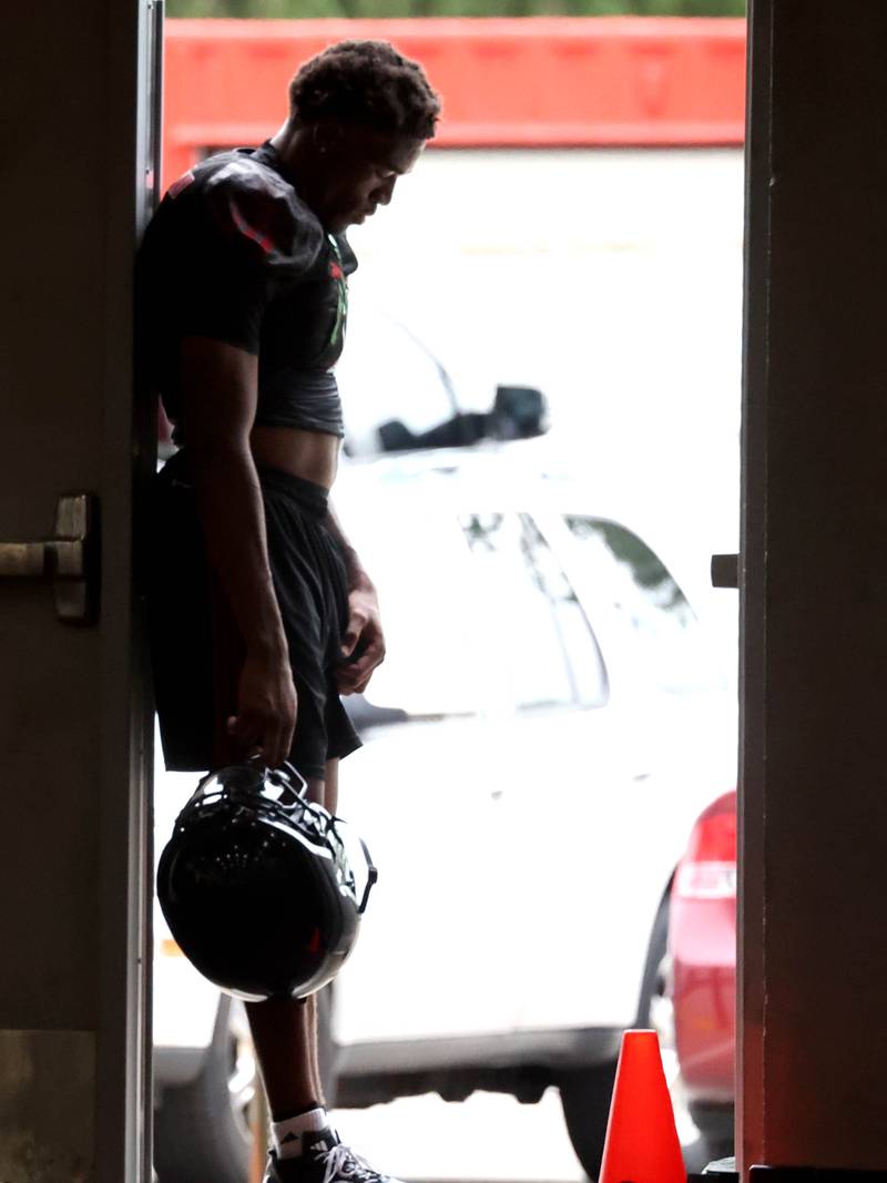Northern Illinois’ Gary Givens grabs some fresh air during a break Wednesday, July 30, 2025, at the teams first practice of the season in the Chessick Practice Center at NIU in DeKalb.