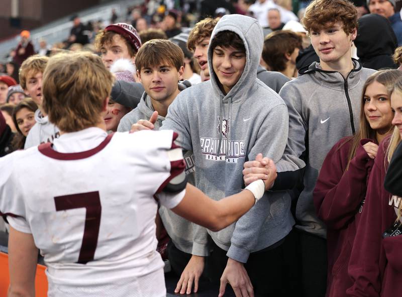 Prairie Ridge's Tyler Vasey thanks fans after their IHSA Class 6A state championship loss to East St. Louis Saturday, Nov. 26, 2022, in Memorial Stadium at the University of Illinois in Champaign.