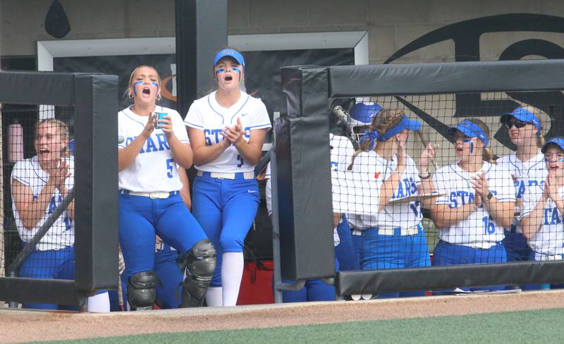 Members of the St. Charles North softball team cheer on their teammates while playing Marist during the Class 4A championship game on Saturday, June 8, 2024 at the Louisville Slugger Sports Complex in Peoria.