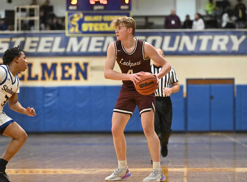 Lockport's Adam Labuda looks to pass the ball against Joliet Central on Monday, Jan. 30, 2023, at Joliet.
