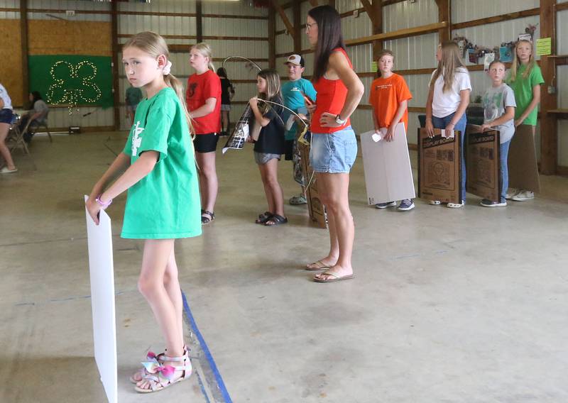 Kids stand in line to wait to have their projects judged during the Marshall-Putnam 4-H Fair on Tuesday, July 23, 2024 at the Marshall-Putnam Fairgrounds in Henry.