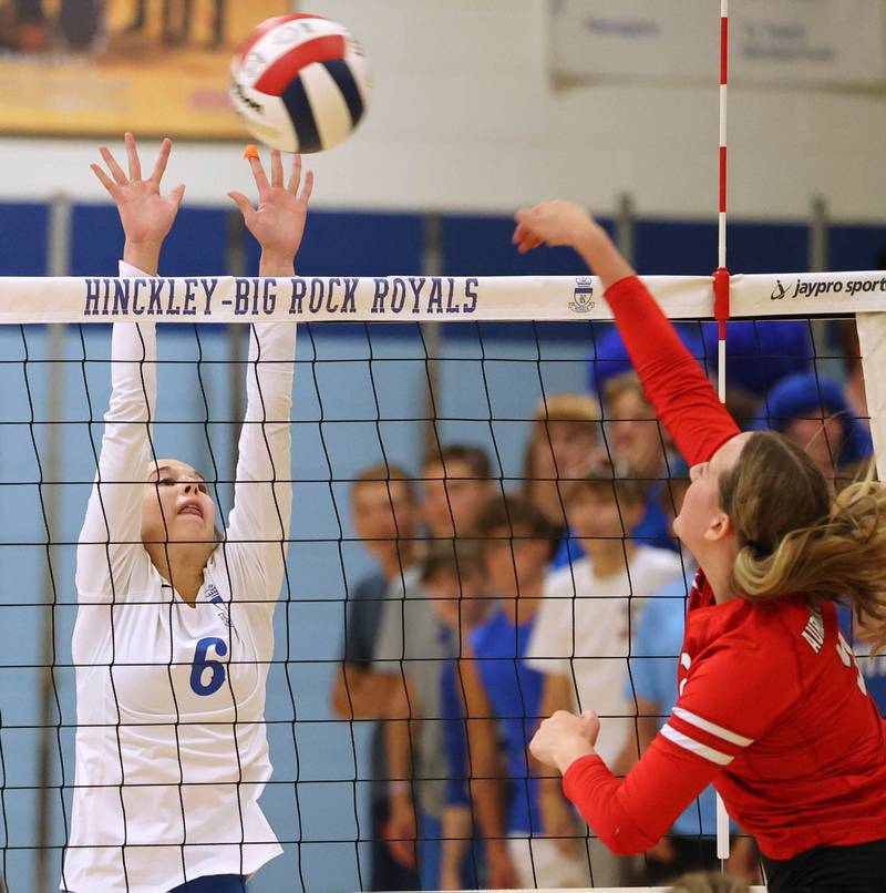 Hinckley-Big Rock’s Courtlyn Brockway goes up for a block during their match against Aurora Christian Tuesday night at the school in Hinckley.