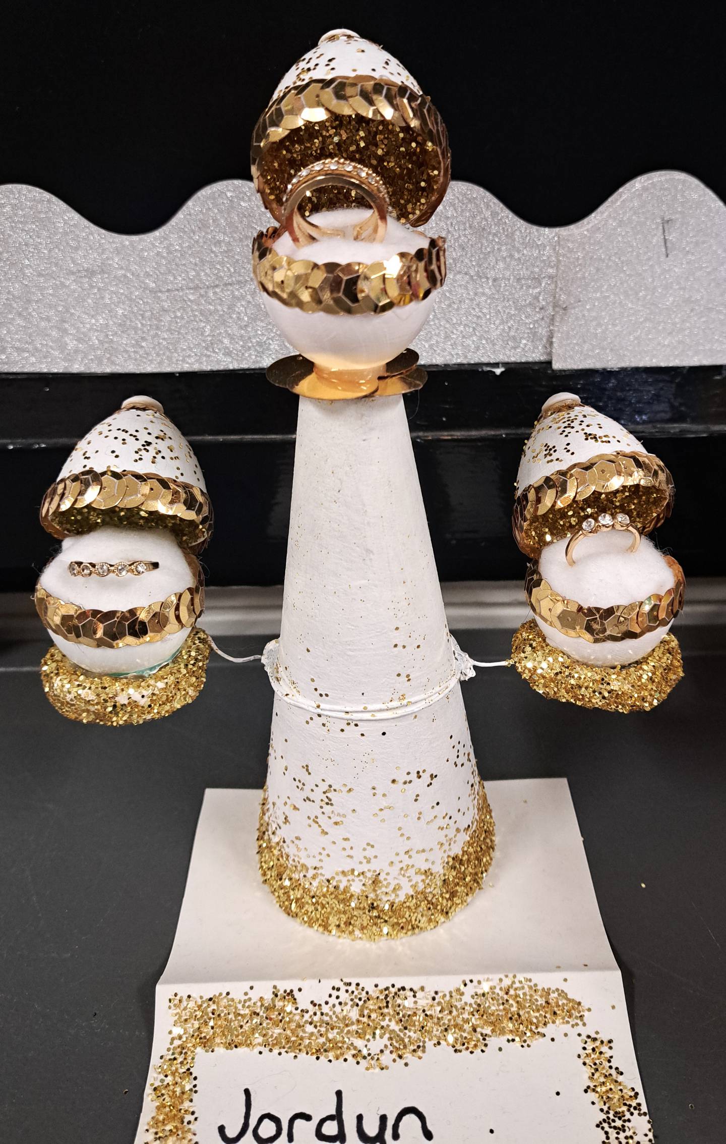 A Faberge egg created by Woodland High School art student Jordyn Leininger has rings inside it.